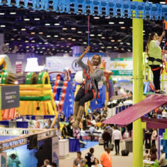 Sky-Rail-adult-woman-participant-IAAPA-RCI-Adventure-Products