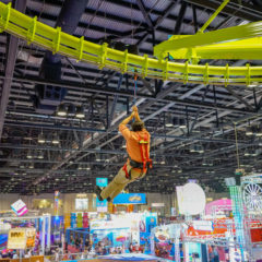 Sky-Rail-indoor-curved-180-zip-line-attraction-man-RCI-Adventure-Products