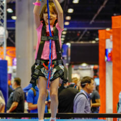 Sky-Tykes-with-Sky-Rail-girl-participant-upclose-RCI-Adventure-Products