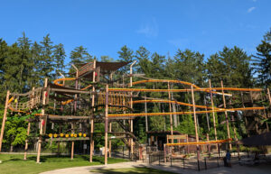 The three level ropes course at Binder Park Zoo, featuring 5 curved ziprails.