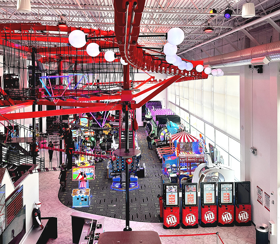 Standing on the Sky Rail® platform looking out over the arcades games at Spy Ninja HQ in Las Vegas