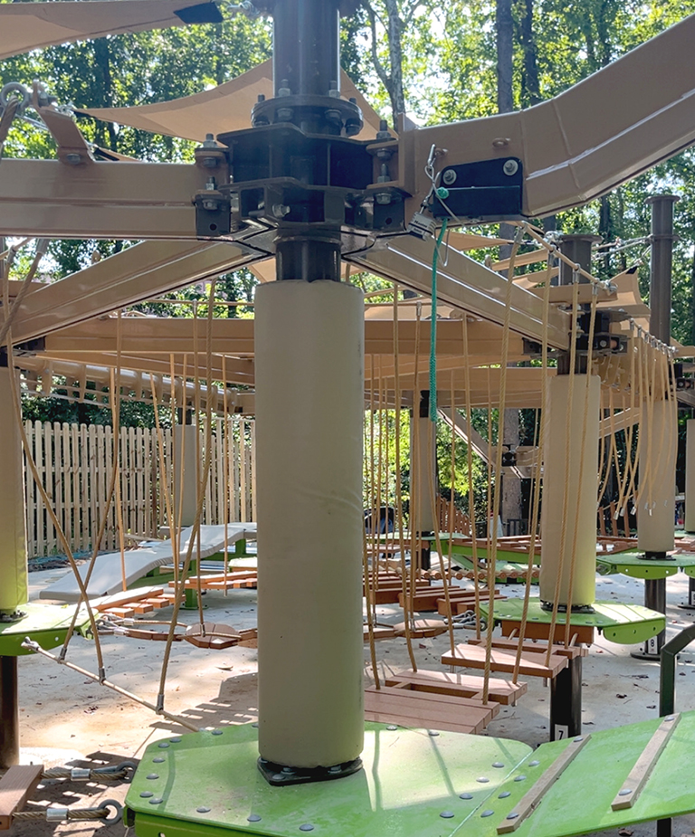 A ground level shot showing various obstacles of the new low ropes course at the Riverbanks Zoo.